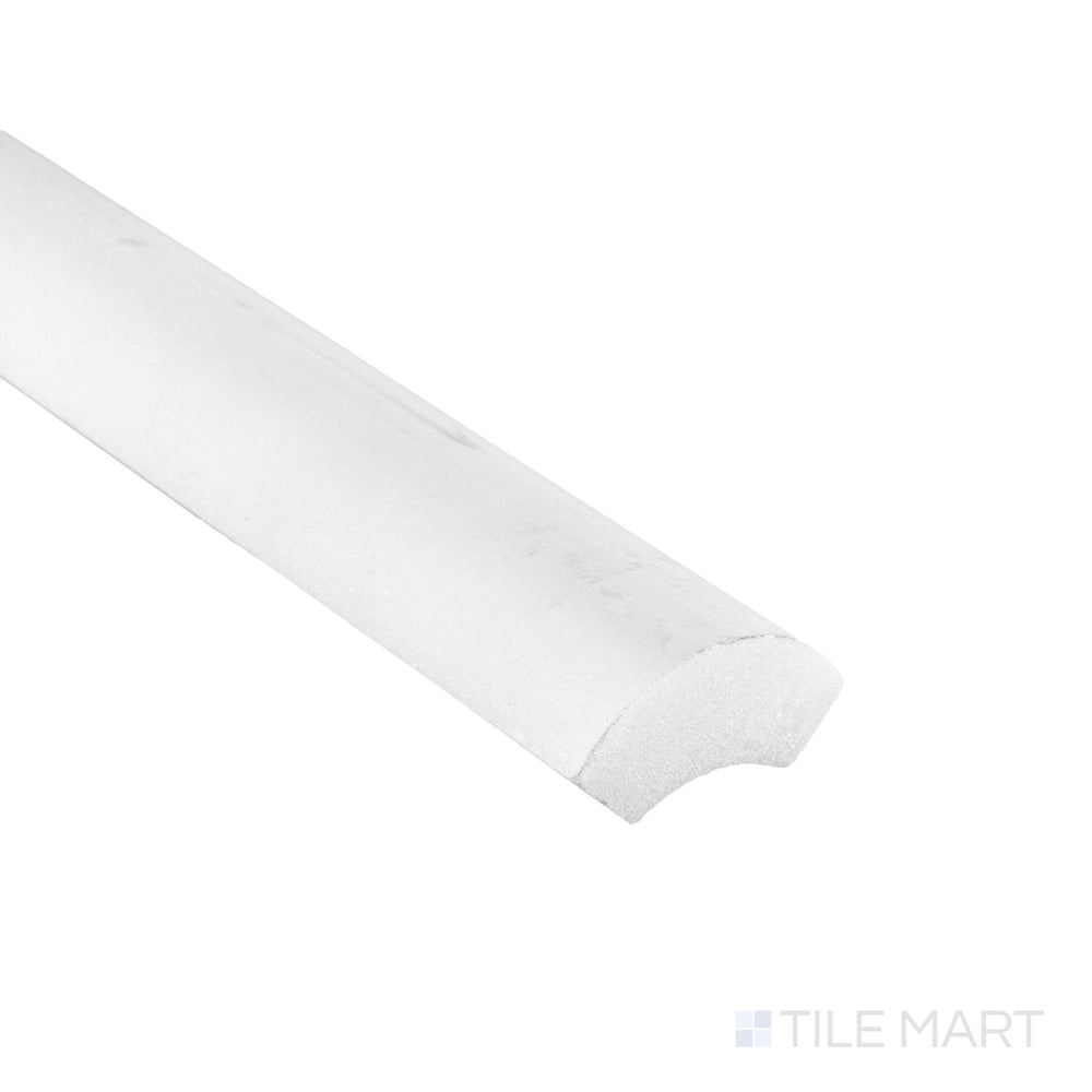 Corner close-up of Oriental White Marble 1x12 honed quarter round showing curved matte edge and natural stone tone.