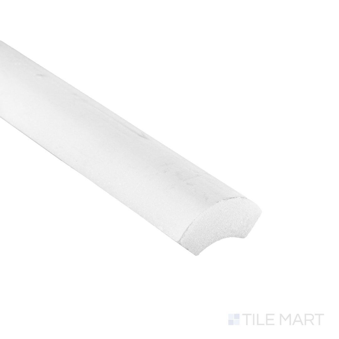Corner close-up of Oriental White Marble 1x12 honed quarter round showing curved matte edge and natural stone tone.