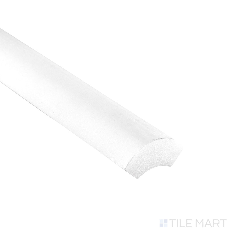 Corner detail of Oriental White Marble 1x12 polished quarter round highlighting smooth rounded profile and glossy finish.