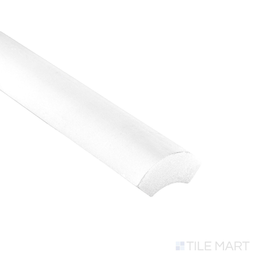Corner detail of Oriental White Marble 1x12 polished quarter round highlighting smooth rounded profile and glossy finish.