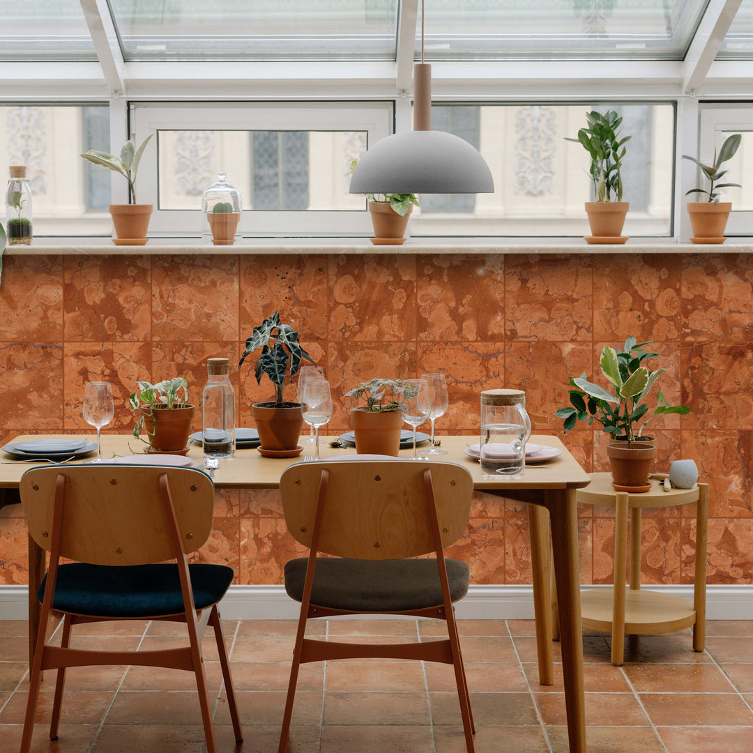 A refined and luxurious interior featuring Rosa Verona Marble 12X12 Polished, enhancing the space with its warm pinkish hues and polished sheen that reflects light beautifully.