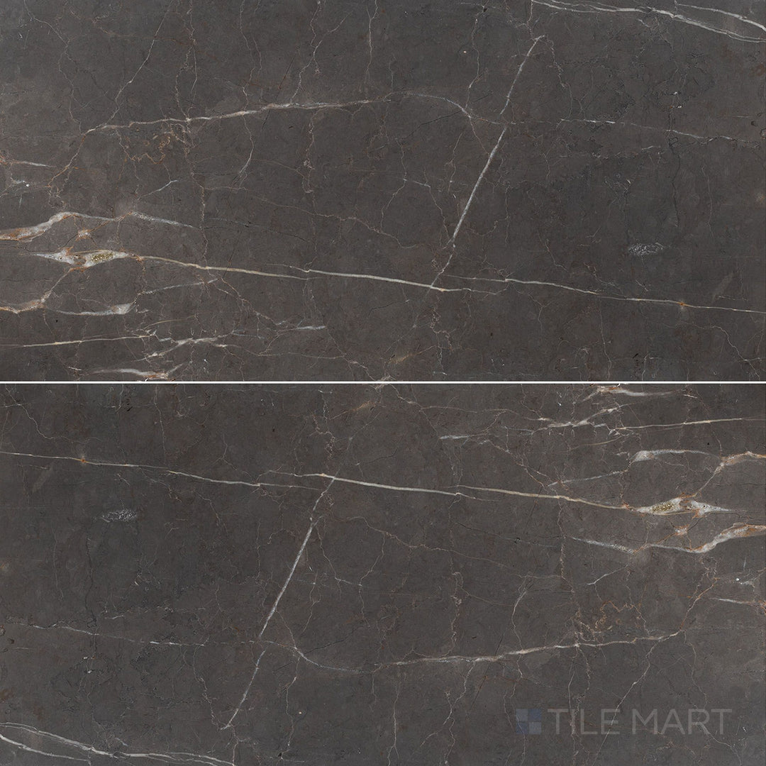 Overhead image of Graphite Marble 12x24 honed tile, showcasing a deep grey hue with a soft matte honed surface.