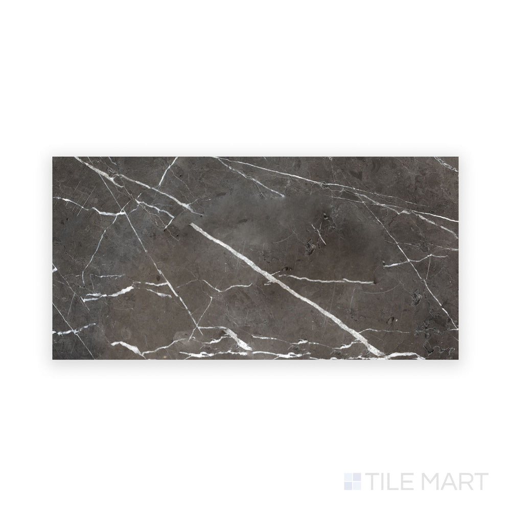 Close-up of Graphite Marble 12X24 Polished Tile, highlighting its sleek surface and rich, graphite hues with intricate natural veining.