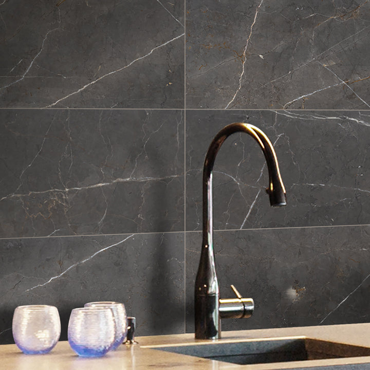 A rich graphite-toned honed marble tile, Graphite Marble 18x18 enhances spaces with depth and contemporary elegance.
