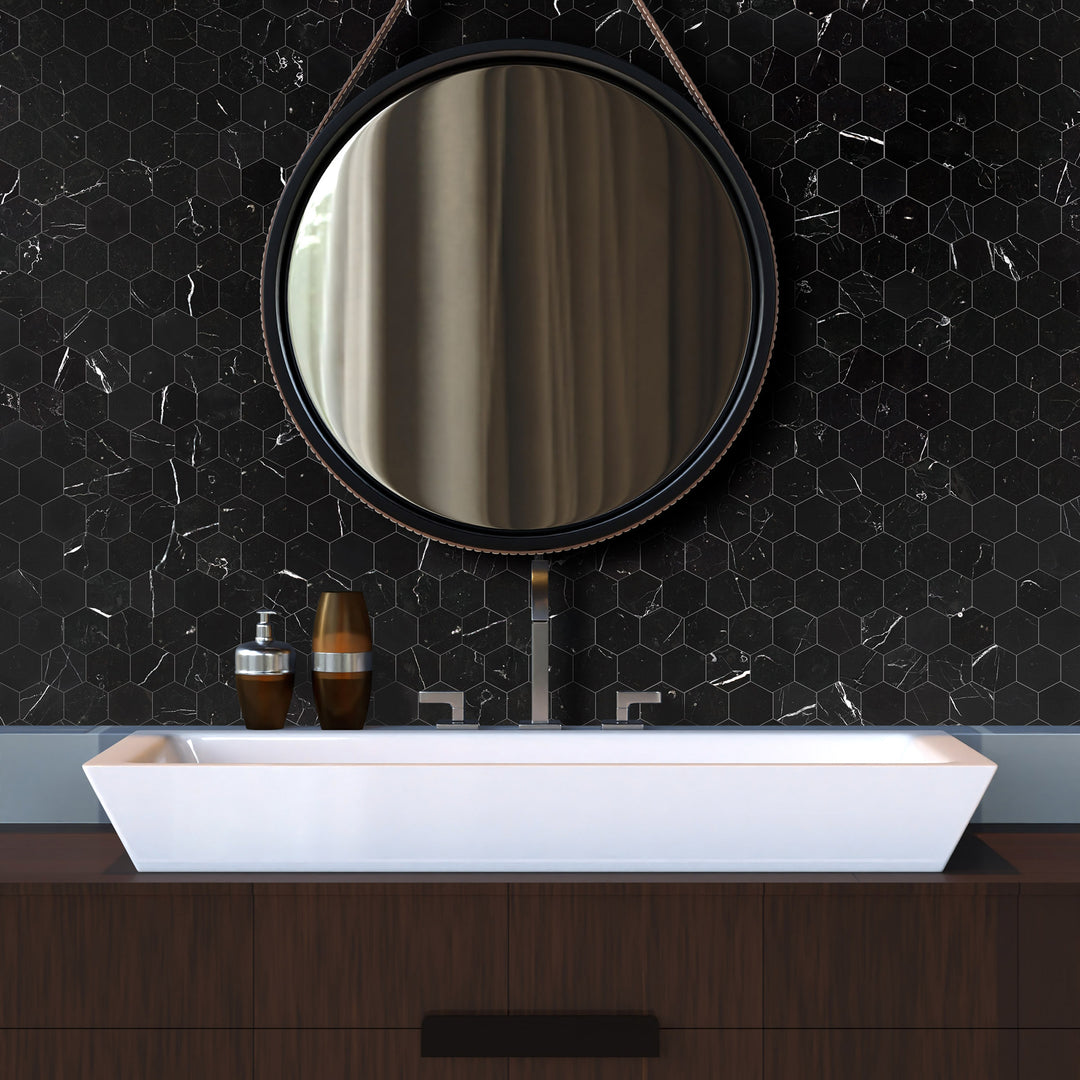 A rich black marble with striking white veining and a honed surface delivers a bold yet elegant touch with Negro Marquina Marble 3x6 honed.