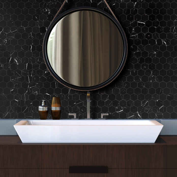 A rich black marble with striking white veining and a honed surface delivers a bold yet elegant touch with Negro Marquina Marble 3x6 honed.