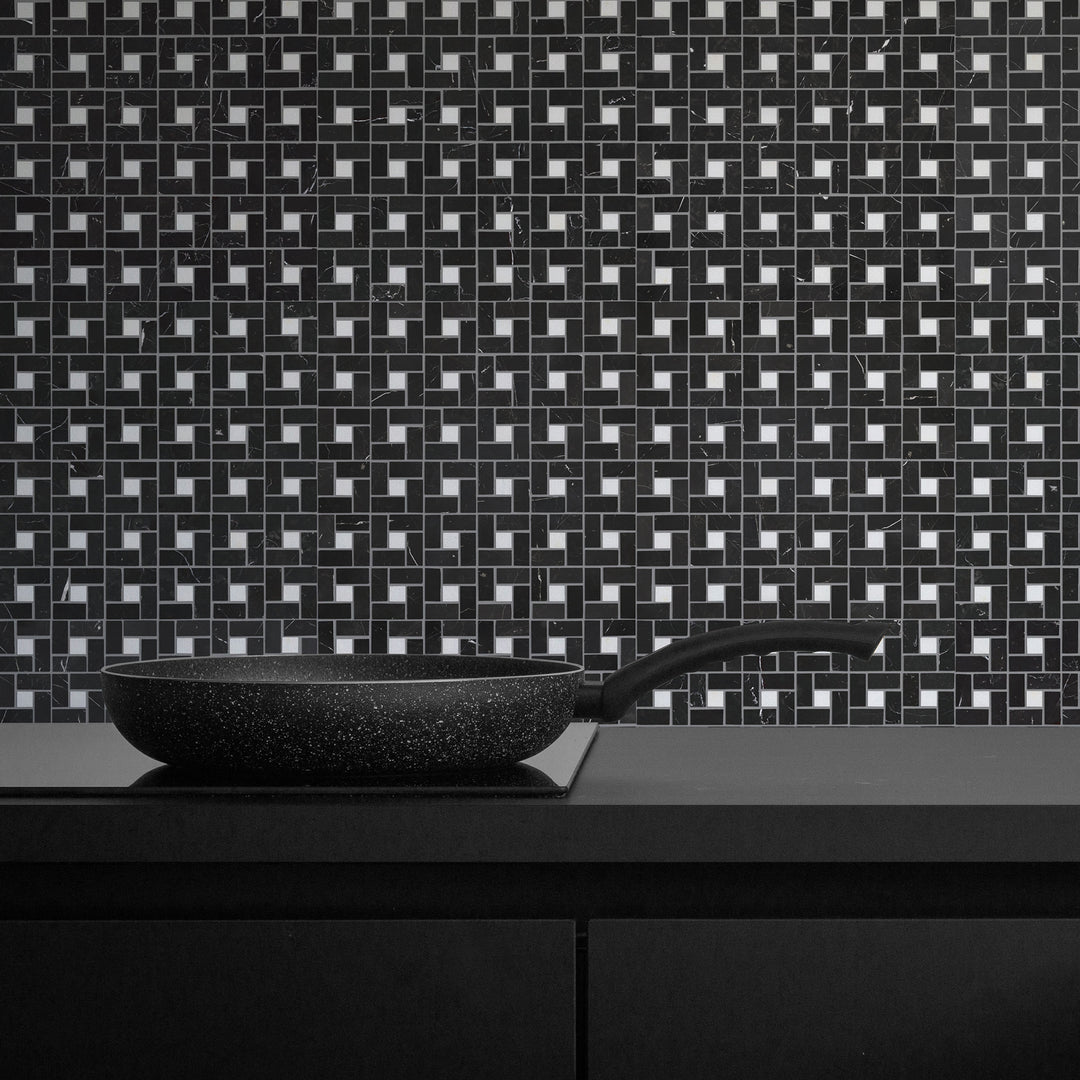 Luxurious deep black marble with striking white veining brings an opulent touch, enhancing the elegance of Negro Marquina Marble 3X6 Honed.