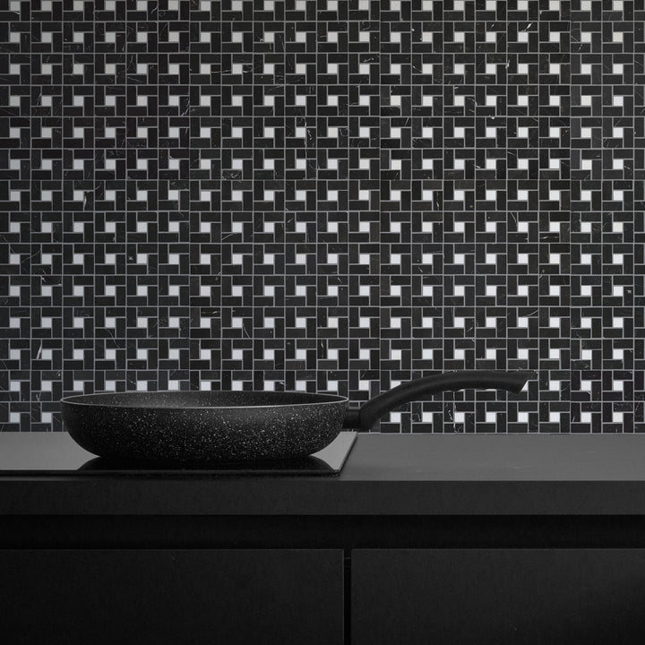 Luxurious deep black marble with striking white veining brings an opulent touch, enhancing the elegance of Negro Marquina Marble 3X6 Honed.