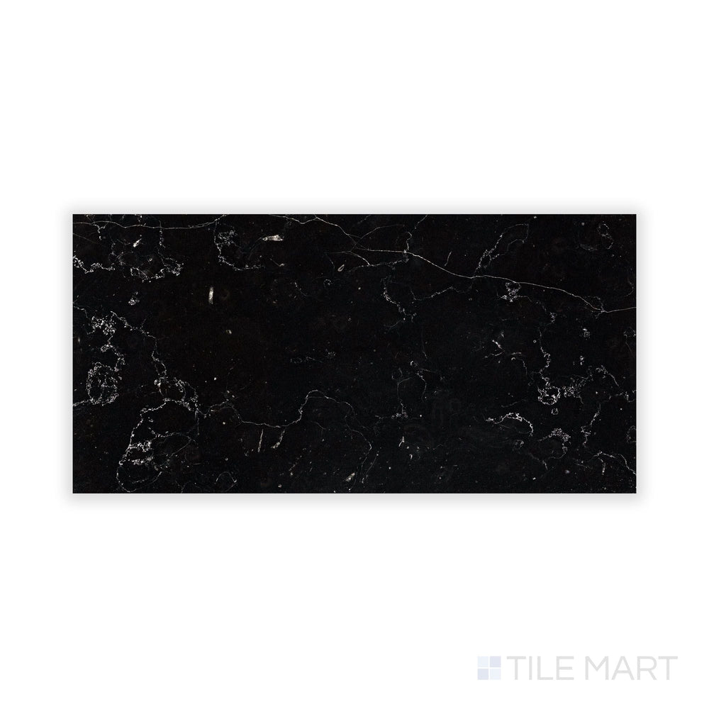 Fine-detail view of Negro Marquina Marble 6X12 Honed Tile, emphasizing its velvety matte texture and delicate veining.