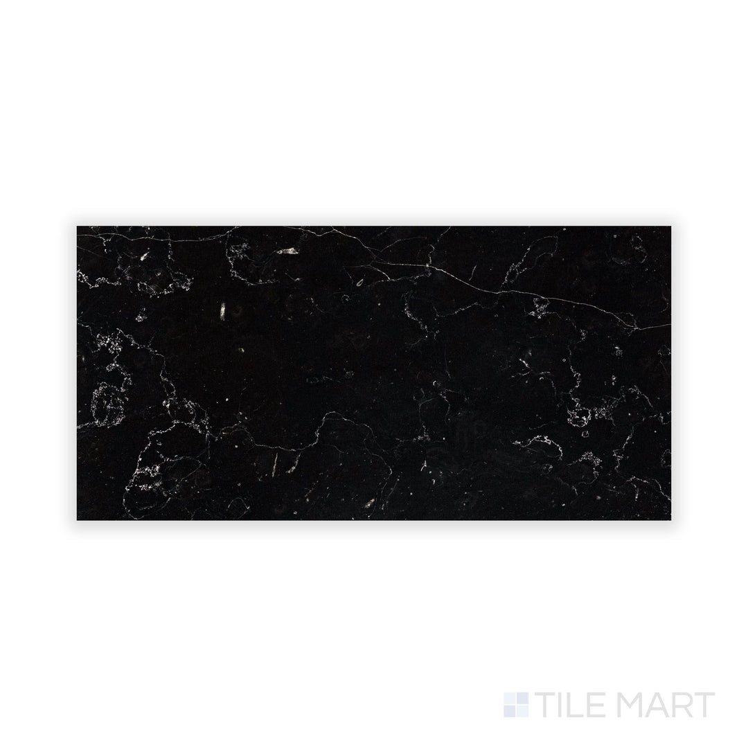 Fine-detail view of Negro Marquina Marble 6X12 Honed Tile, emphasizing its velvety matte texture and delicate veining.