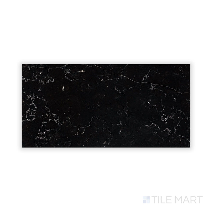 Fine-detail view of Negro Marquina Marble 6X12 Honed Tile, emphasizing its velvety matte texture and delicate veining.