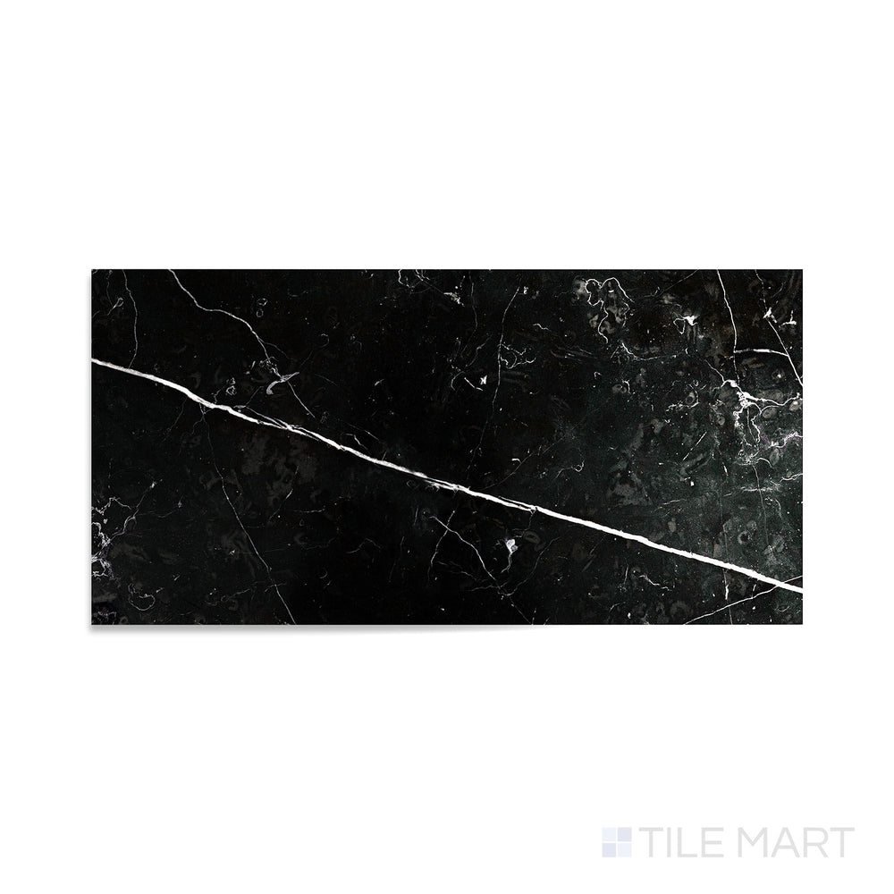 Detailed view of Negro Marquina Marble 12X24 Polished Tile, showcasing its rich black tones with a glossy, reflective surface.