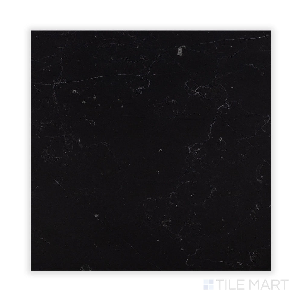 A fine-detail capture of Negro Marquina Marble 24X24 Honed Tile, highlighting its subtle sheen and soft, honed finish.