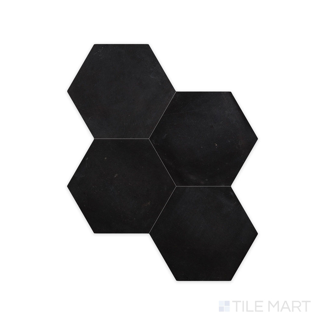 A sharp close-up of Negro Marquina Marble 6" Hexagon Honed Tile, showcasing its smooth, matte finish with distinct veining.