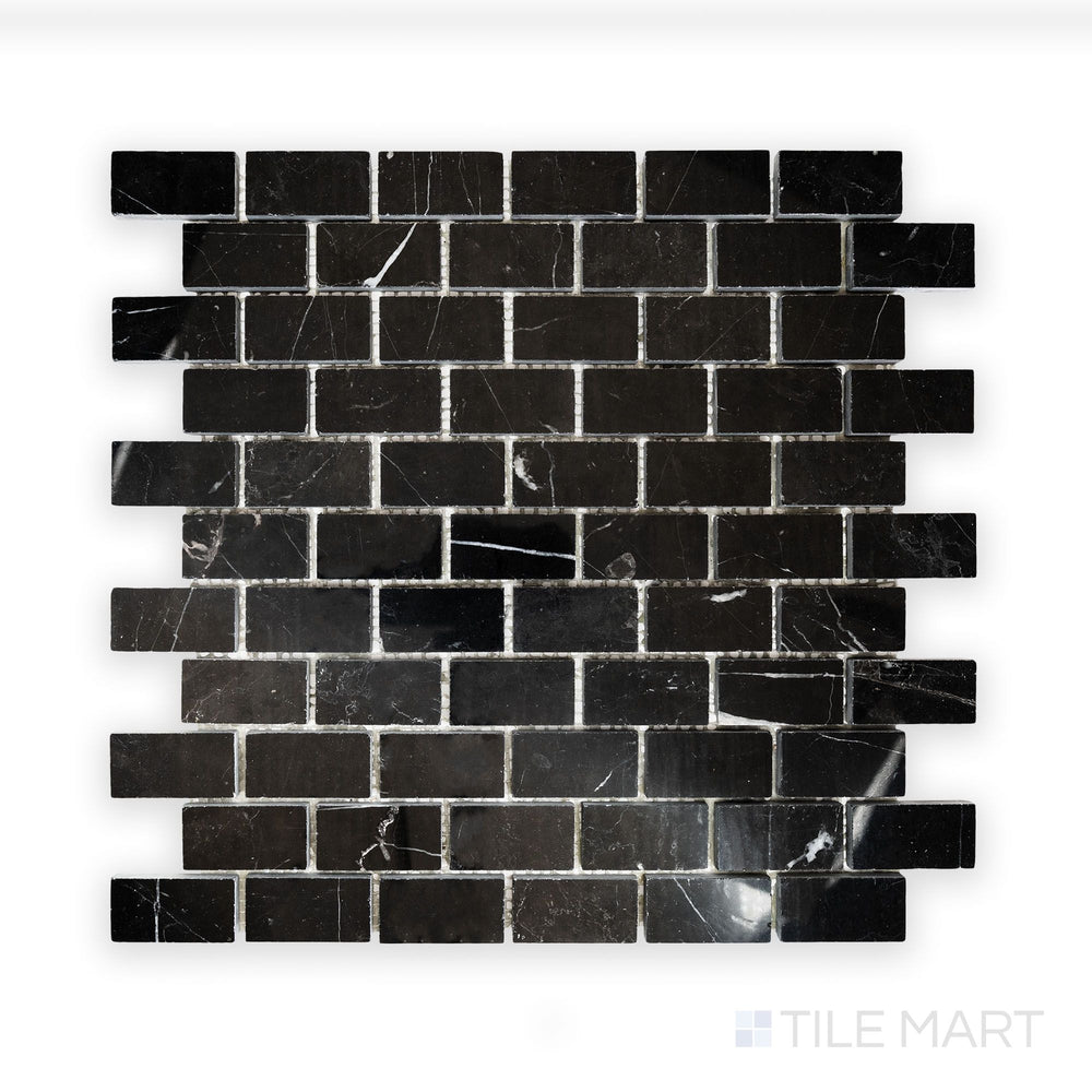 A fine-detail close-up of Negro Marquina Marble 1X2 Brick Polished Mosaic, presenting an elegant shine and refined veining patterns.