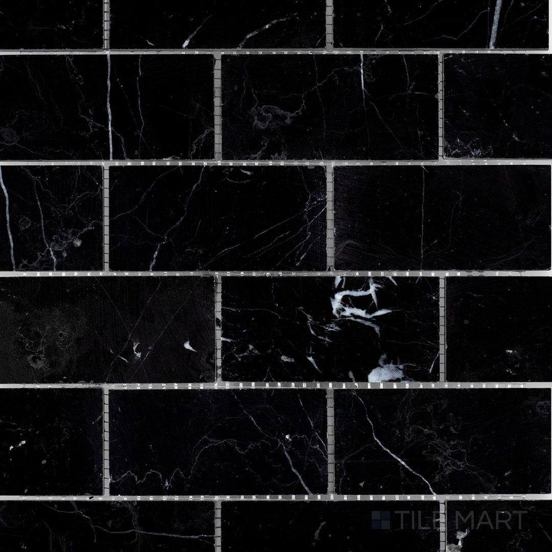Overhead image of Negro Marquina Marble 2x4 brick honed mosaic, displaying a larger brick format with a smooth honed texture.