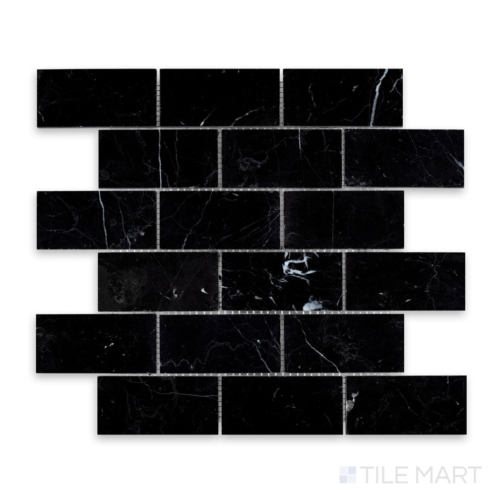 Close-up of Negro Marquina Marble 2X4 Brick Honed Mosaic, featuring deep black tones and a sophisticated matte finish.