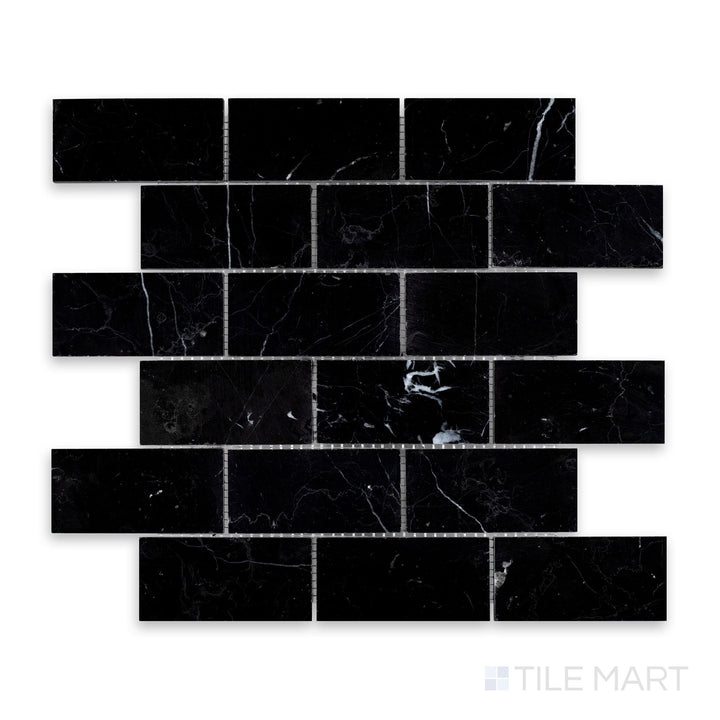 Close-up of Negro Marquina Marble 2X4 Brick Honed Mosaic, featuring deep black tones and a sophisticated matte finish.