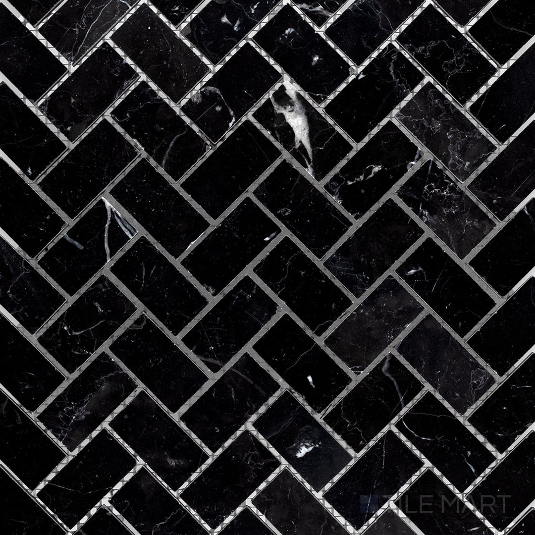 Top-down view of Negro Marquina Marble 1x2 herringbone honed mosaic, featuring an elegant herringbone layout with a refined matte surface.