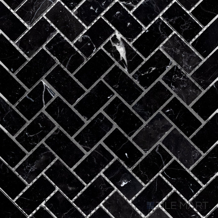 Top-down view of Negro Marquina Marble 1x2 herringbone honed mosaic, featuring an elegant herringbone layout with a refined matte surface.