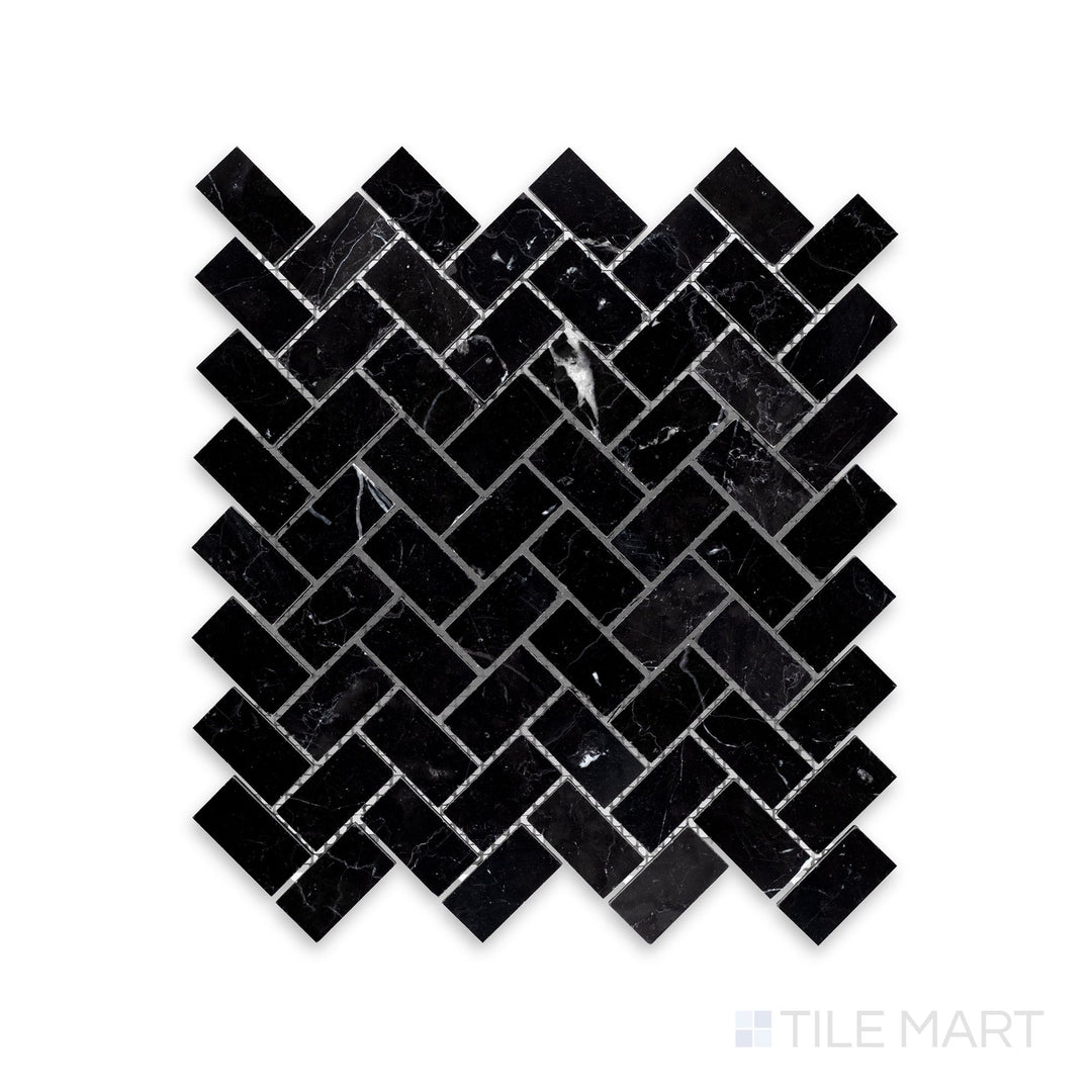 A zoomed-in look at Negro Marquina Marble 1X2 Herringbone Honed Mosaic, highlighting the bold veining and smooth matte texture.