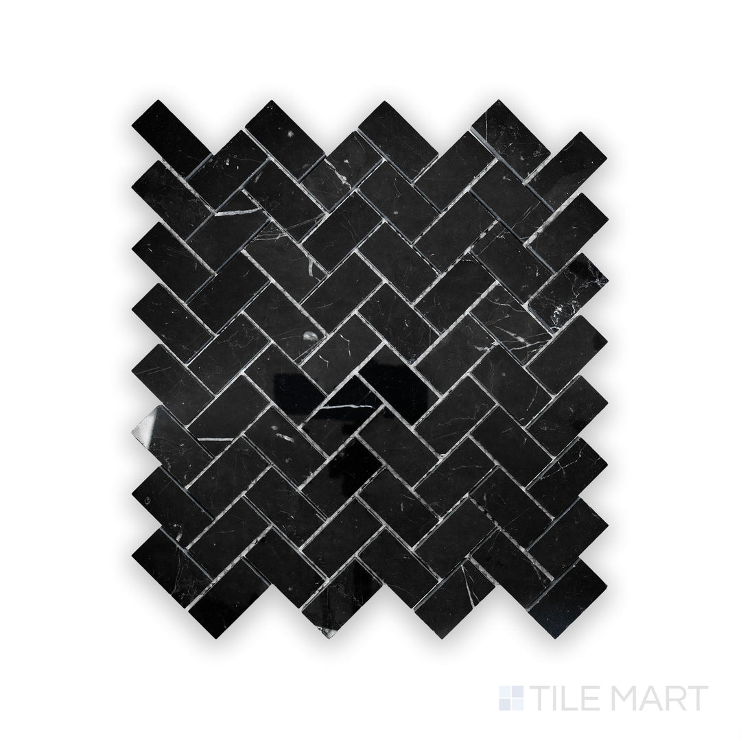 A fine-detail capture of Negro Marquina Marble 1X2 Herringbone Polished Mosaic, presenting an elegant glossy surface with striking white veins.