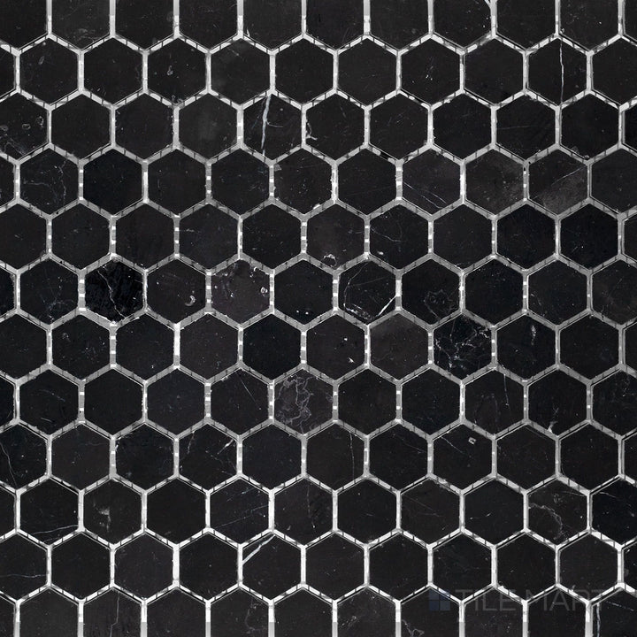 Top-down view of Negro Marquina Marble 1" hexagon honed mosaic, featuring a geometric hexagonal pattern with a smooth honed texture.