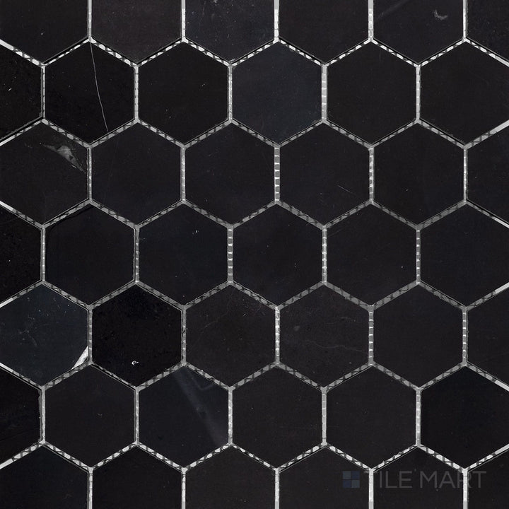 Flat-lay shot of Negro Marquina Marble 2" hexagon honed mosaic, featuring a structured hexagonal arrangement with a refined honed surface.