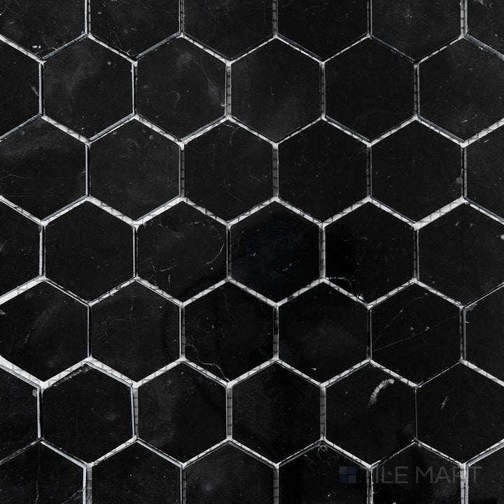 Top-view photo of Negro Marquina Marble 2" hexagon polished mosaic, displaying a polished hexagonal layout that enhances its deep black tones.