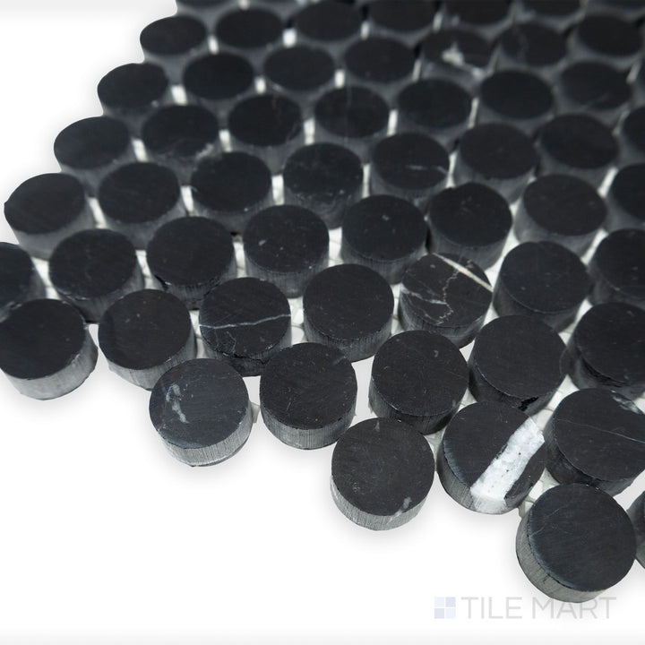 A classic penny round arrangement is displayed in this angled corner shot of Negro Marquina Marble 3/4" penny round honed mosaic, where its honed texture provides a subtle elegance.