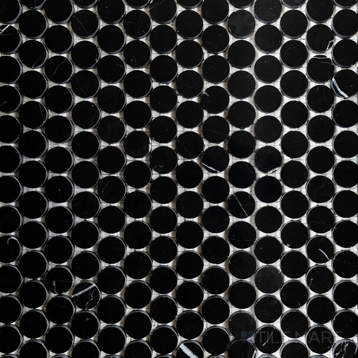 Overhead image of Negro Marquina Marble 3/4" penny round polished mosaic, featuring a reflective polished surface that highlights its deep black shade.