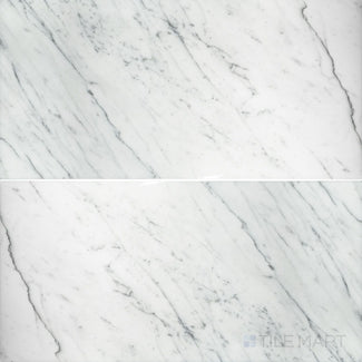 Flat-lay shot of Statuary White Marble 12x24 polished tile, offering a high-gloss finish that highlights the elegant white marble and subtle veining.