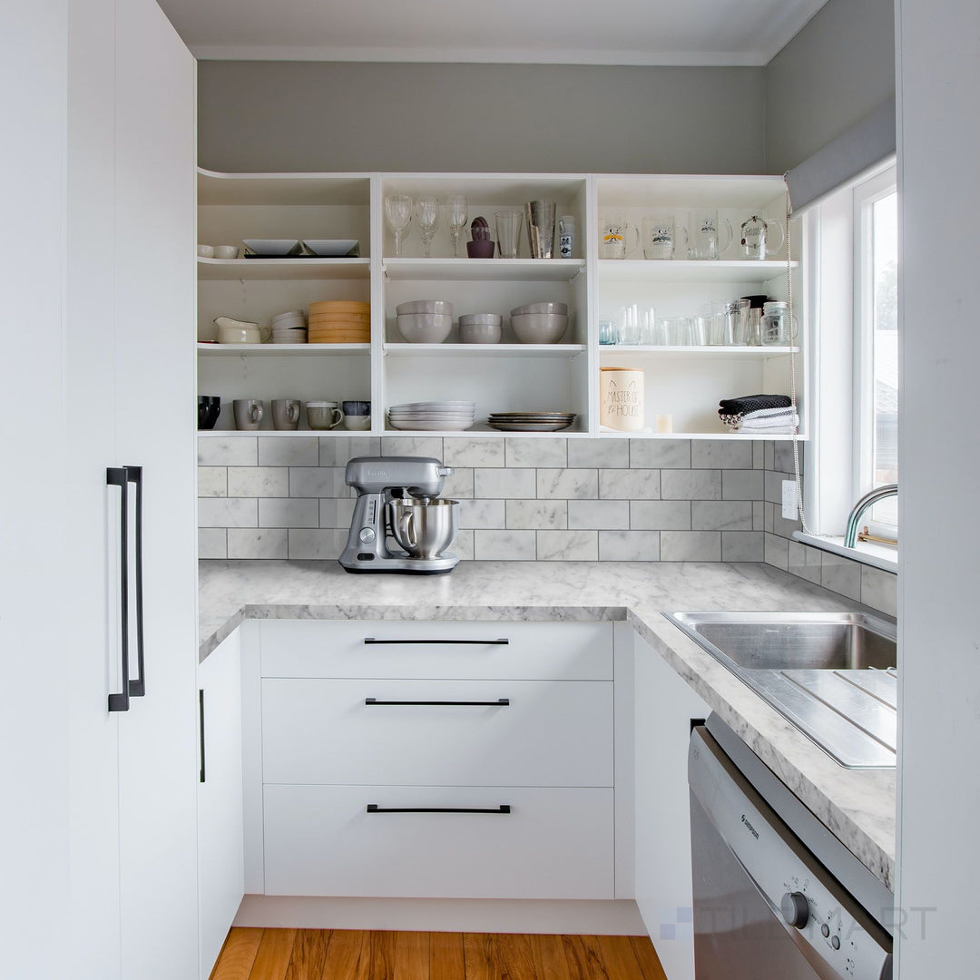 Fresh sophistication crafted around White Carrara Marble 3X6 Honed's clean tones