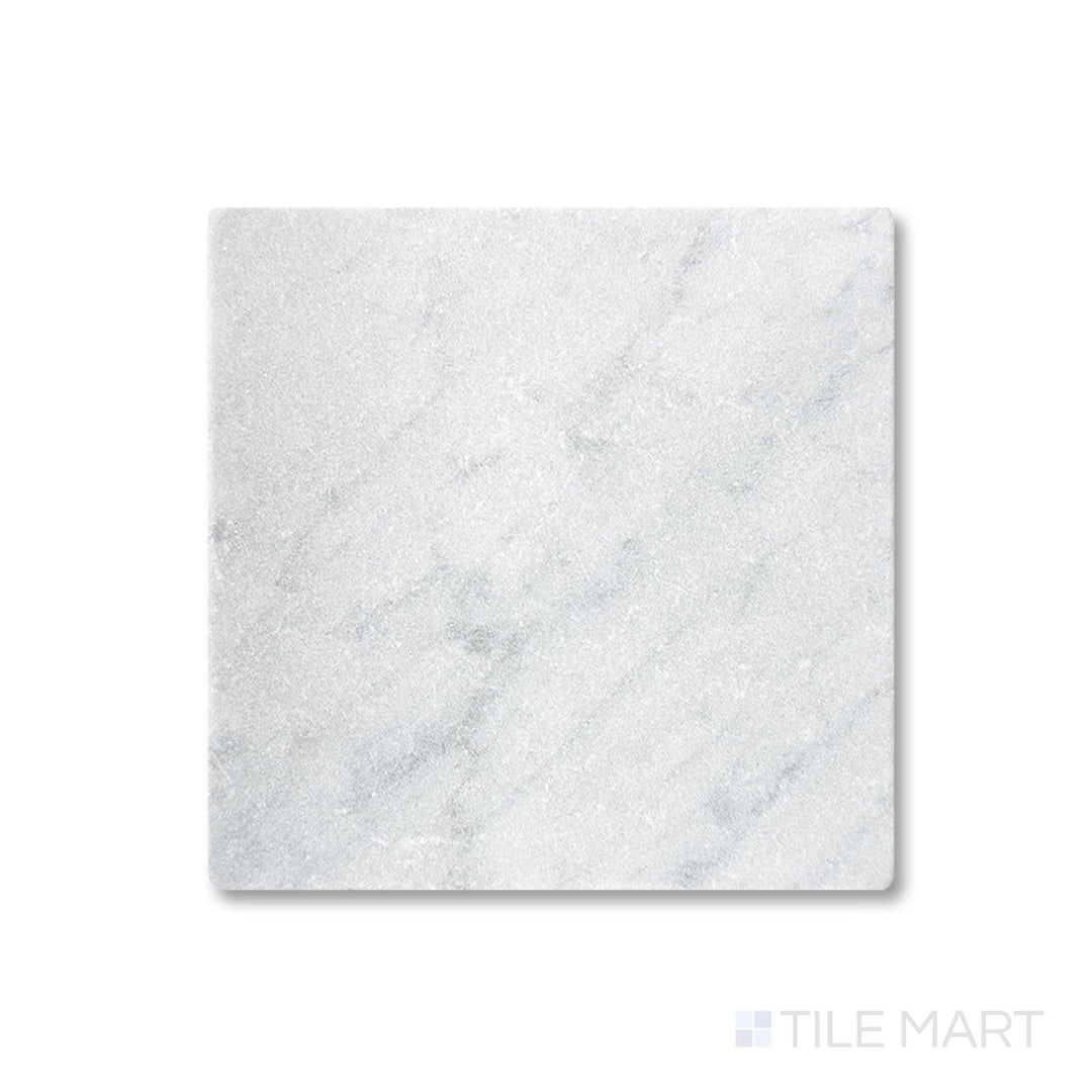 Full view from above of White Carrara Marble 4x4 tumbled tile displaying textured marble squares with a rustic natural look