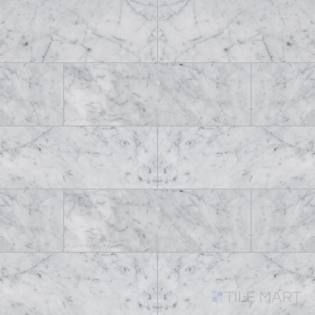 Top view of White Carrara Marble 4x12 honed tile, highlighting elongated marble tiles with a soft matte finish ideal for elegant layouts