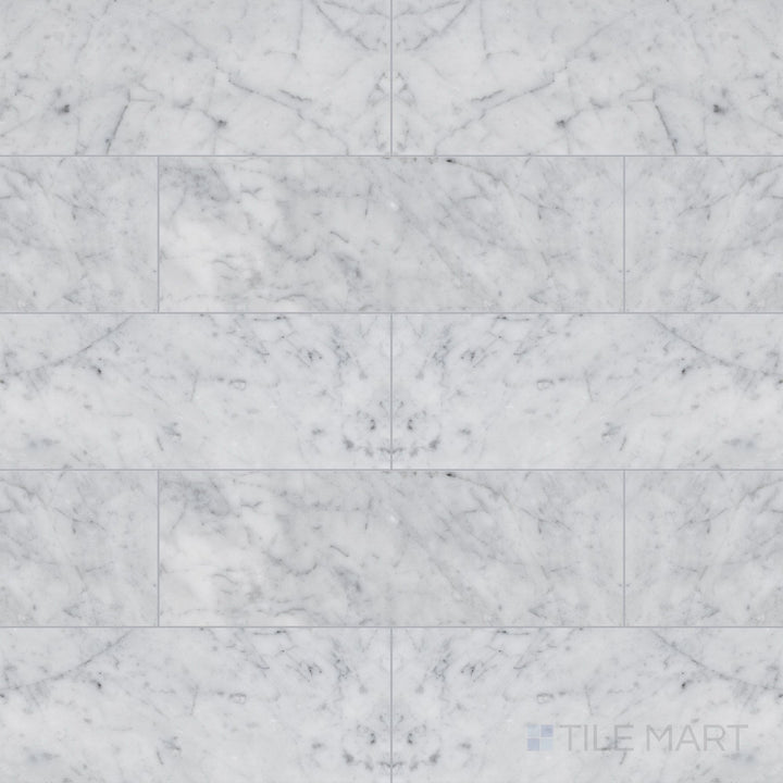 Top view of White Carrara Marble 4x12 honed tile, highlighting elongated marble tiles with a soft matte finish ideal for elegant layouts