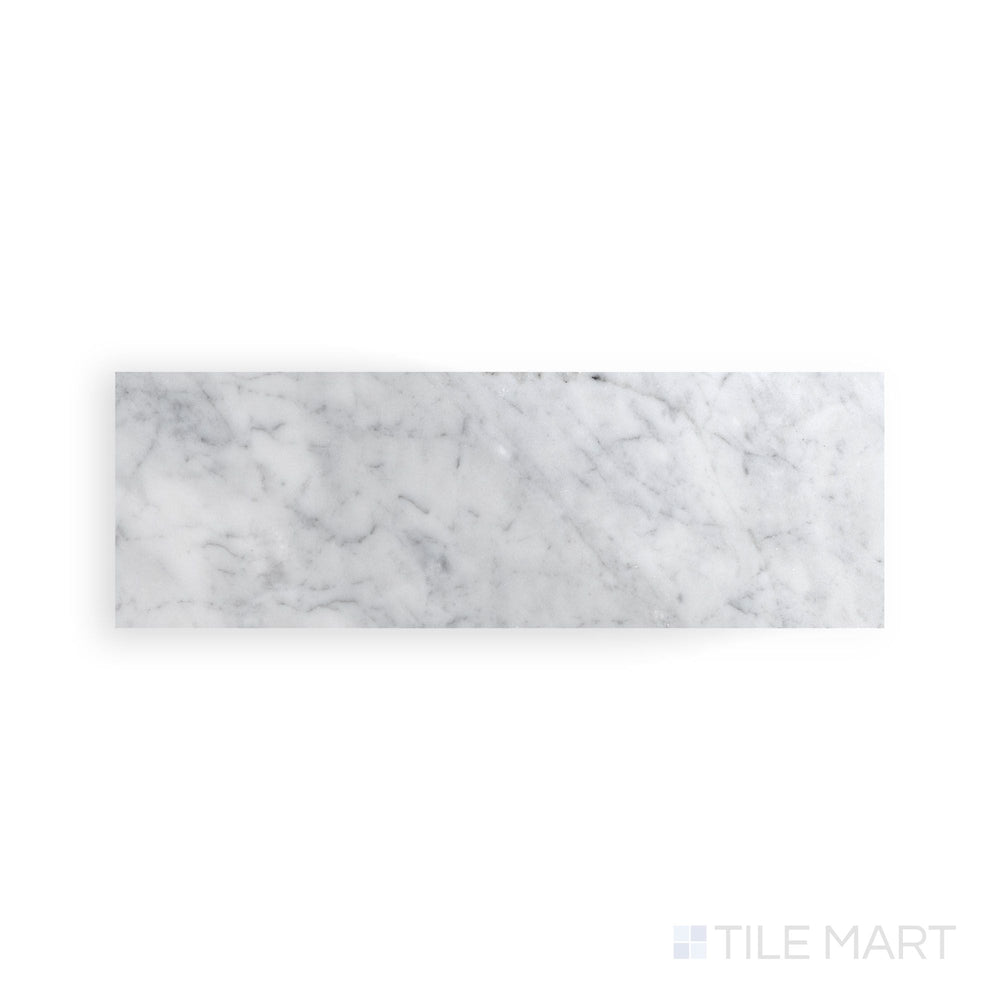 Full view from above of White Carrara Marble 4x12 polished tile displaying elongated glossy marble tiles ideal for walls and backsplashes