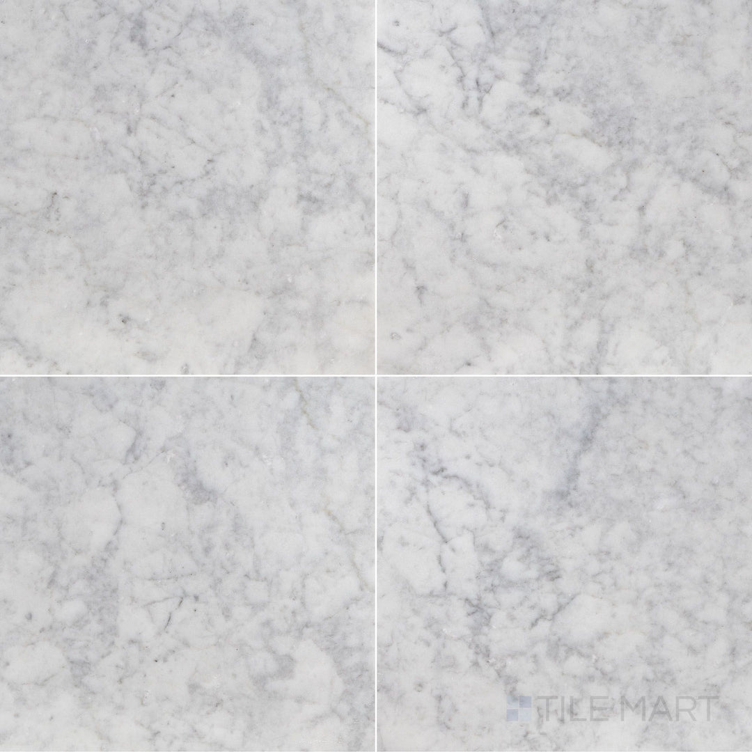 Overhead shot of White Carrara Marble 18x18 honed tile, offering expansive matte marble squares suited for elegant spaces