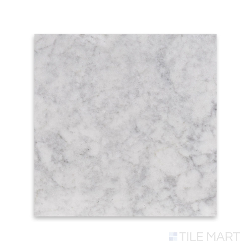 Overview of White Carrara Marble 18x18 honed tile showing large soft-finish marble slabs arranged in a classic format
