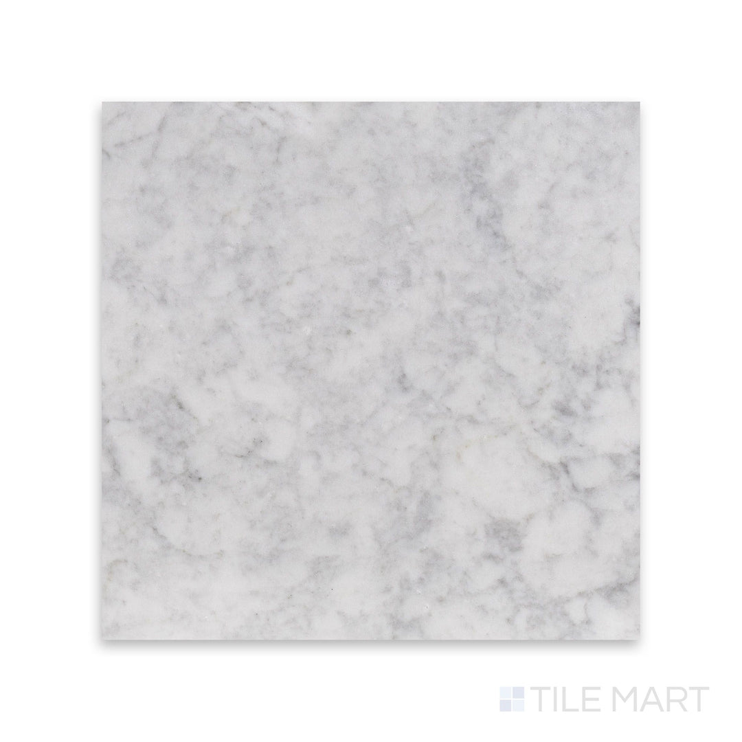 Overview of White Carrara Marble 18x18 honed tile showing large soft-finish marble slabs arranged in a classic format
