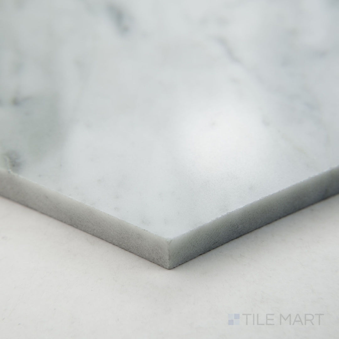 Corner perspective displaying White Carrara Marble 6" hexagon polished tile with a glossy surface and classic natural marble appeal
