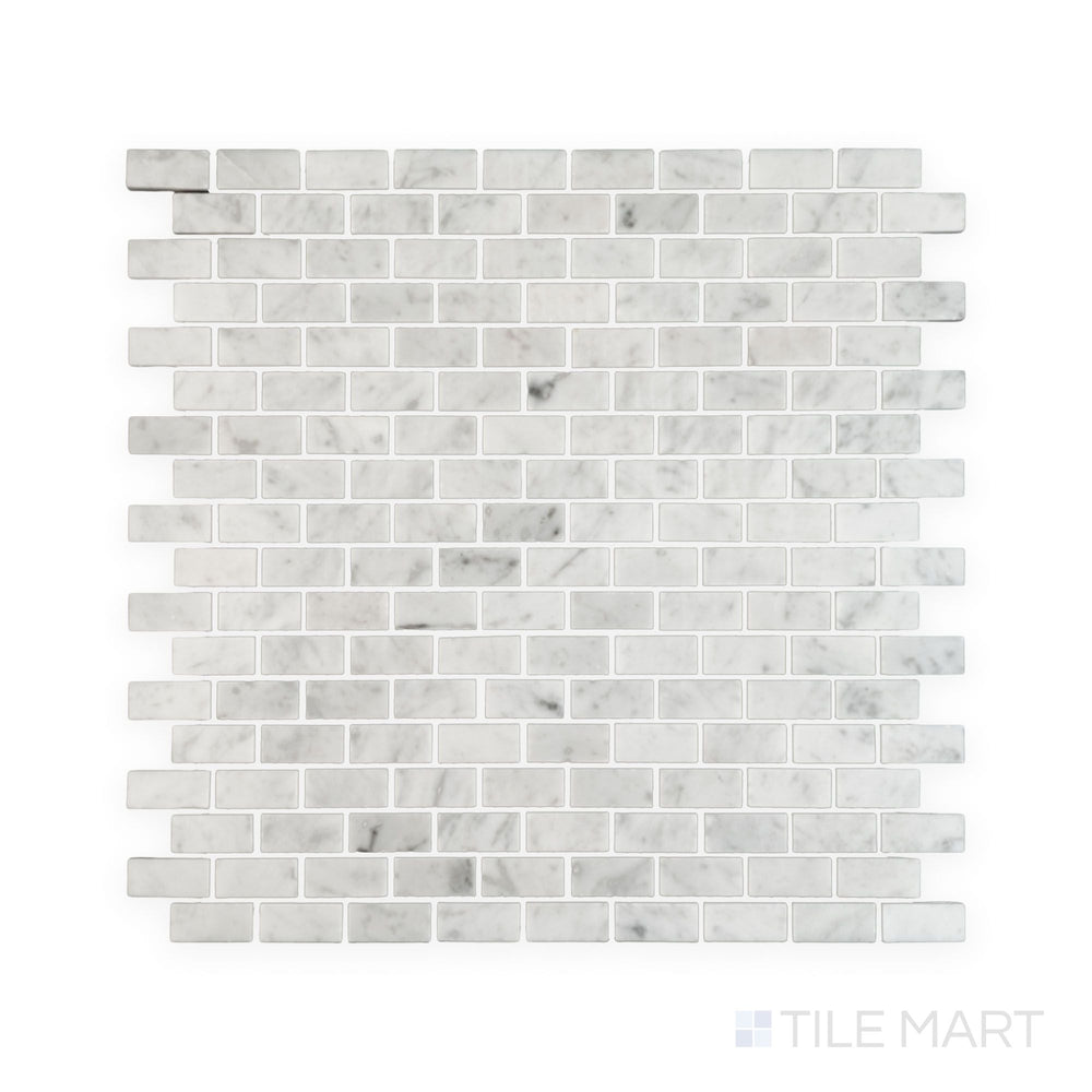 Tile showcase of White Carrara Marble 5/8x1-1/4 brick polished mosaic highlighting glossy marble bricks set in a traditional running bond