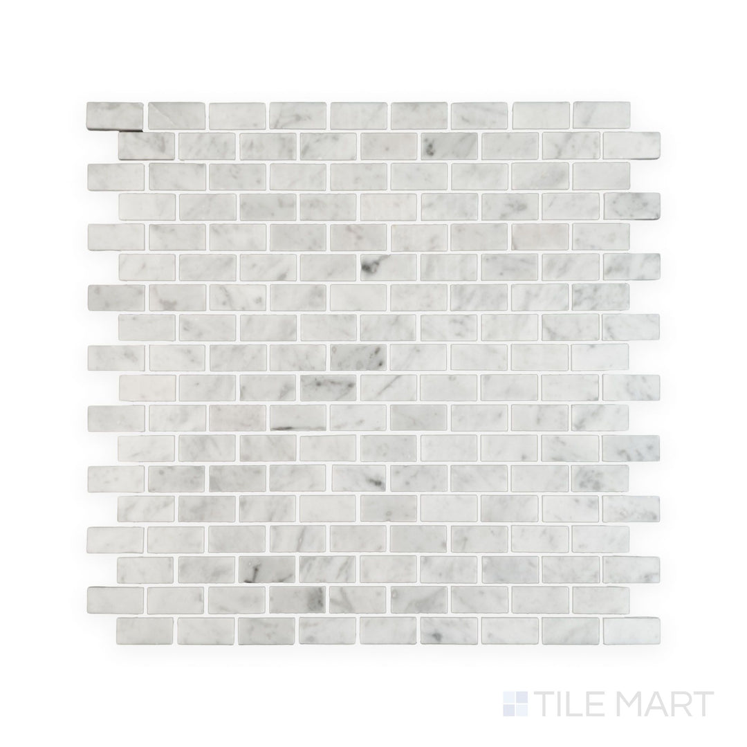 Tile showcase of White Carrara Marble 5/8x1-1/4 brick polished mosaic highlighting glossy marble bricks set in a traditional running bond