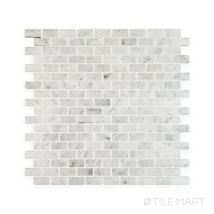 Tile showcase of White Carrara Marble 5/8x1-1/4 brick polished mosaic highlighting glossy marble bricks set in a traditional running bond