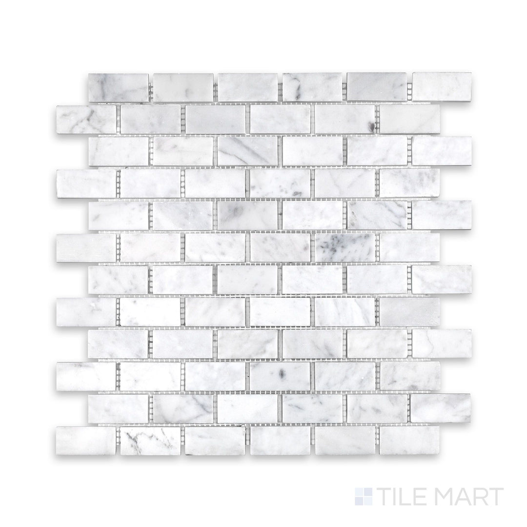 Product layout of White Carrara Marble 1x2 brick honed mosaic featuring small matte marble rectangles arranged in a neat linear pattern