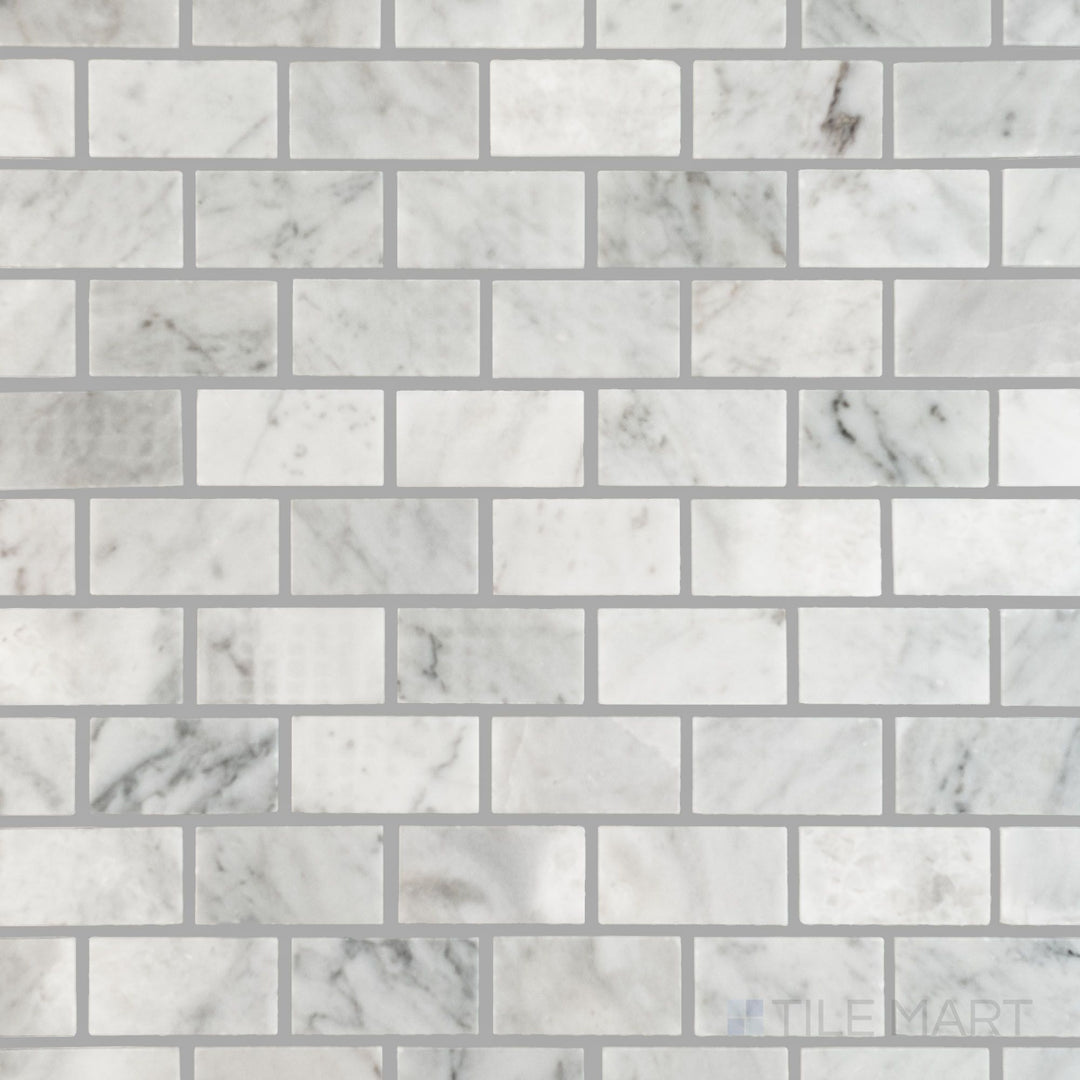 Overhead perspective of White Carrara Marble 1x2 brick polished mosaic with glossy rectangular tiles creating a crisp, modern surface finish