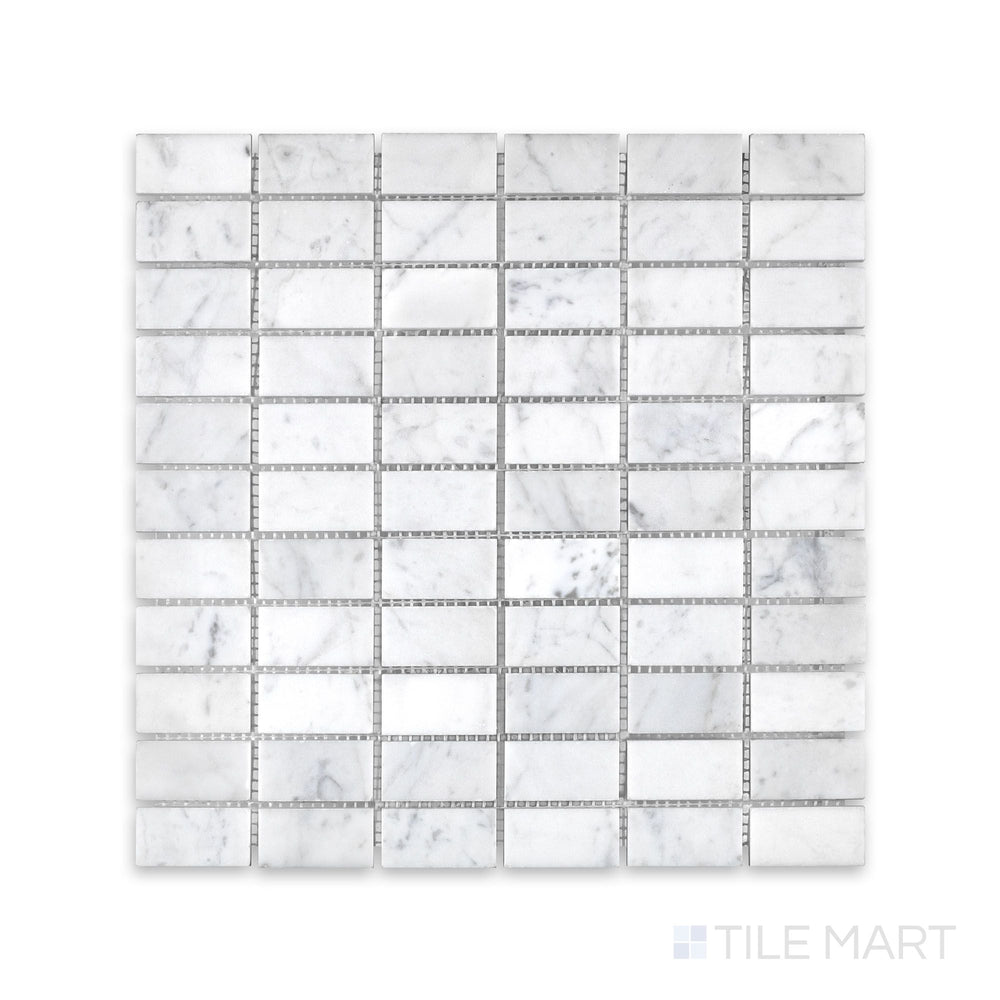 Overhead view of White Carrara Marble stacked polished mosaic, featuring narrow rectangular white marble pieces stacked horizontally in a clean, modern layout with polished finish.