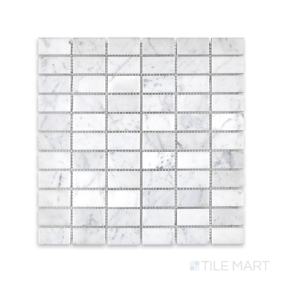 Overhead view of White Carrara Marble stacked polished mosaic, featuring narrow rectangular white marble pieces stacked horizontally in a clean, modern layout with polished finish.
