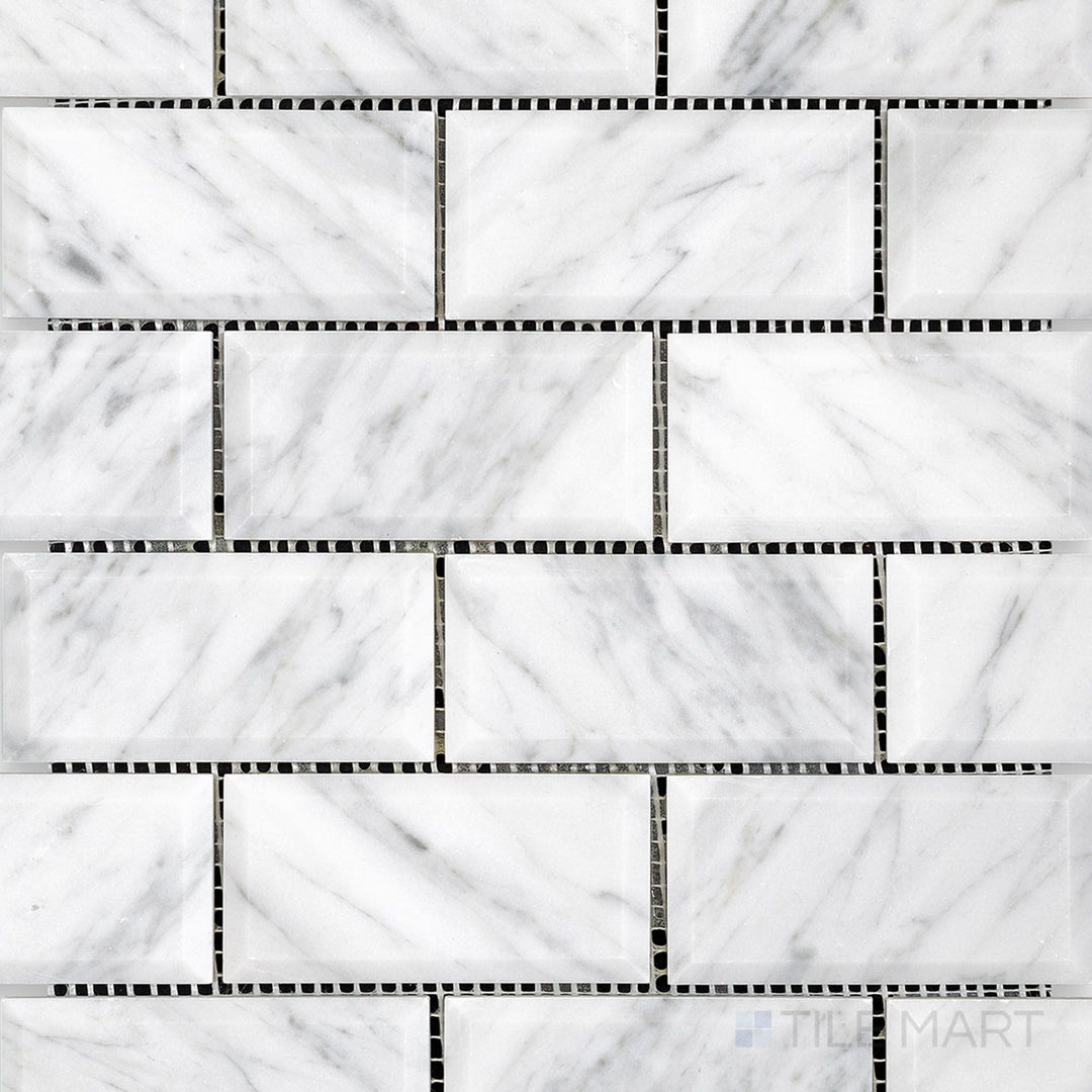 Overhead shot showing White Carrara Marble 2x4 brick beveled honed mosaic, highlighting crisp edges and a subtle matte finish