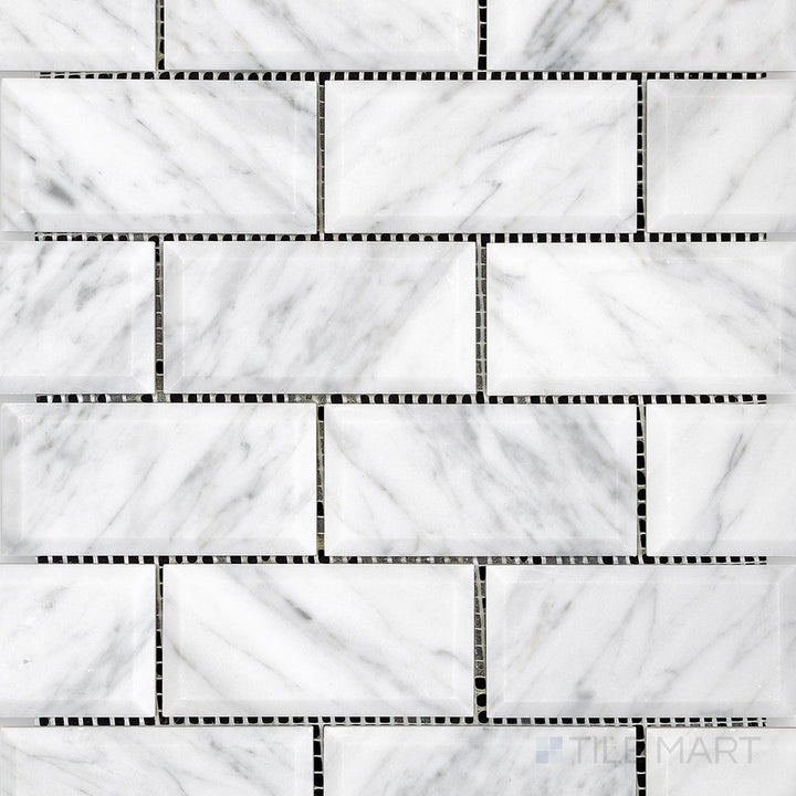 Overhead shot showing White Carrara Marble 2x4 brick beveled honed mosaic, highlighting crisp edges and a subtle matte finish